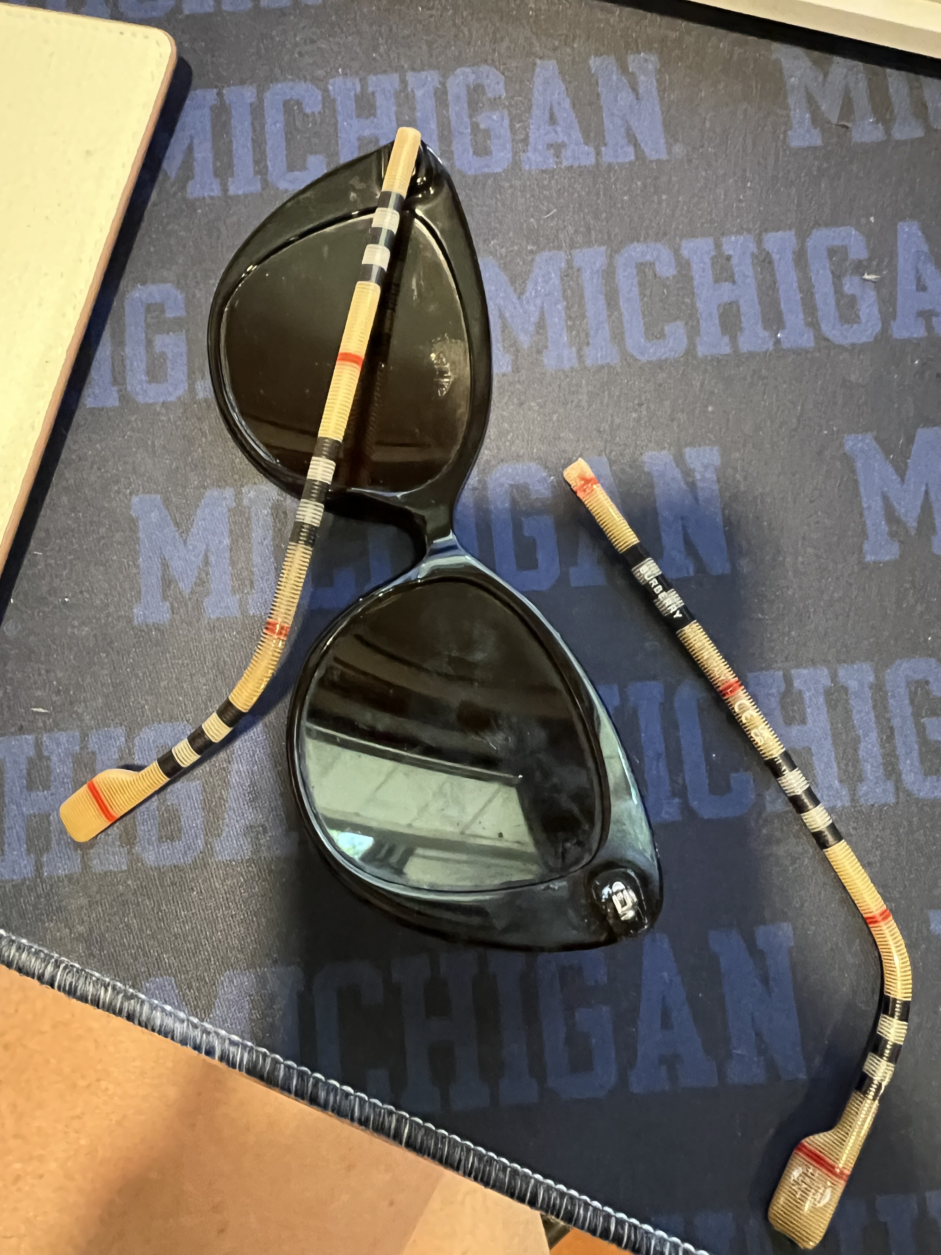 Burberry sunglasses with an unattached temple.